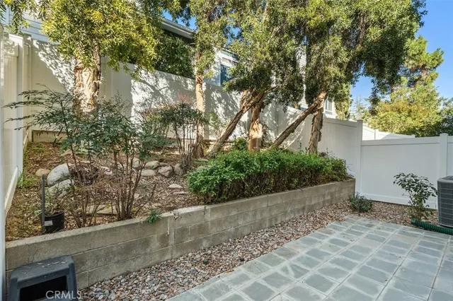 a view of a back yard of the house