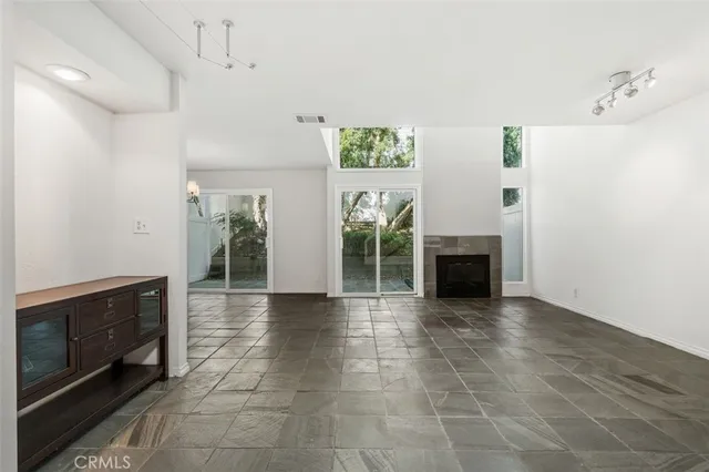 a view of livingroom with furniture and fireplace