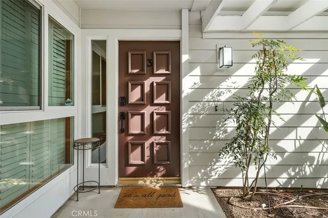 a view of livingroom with furniture and an empty room