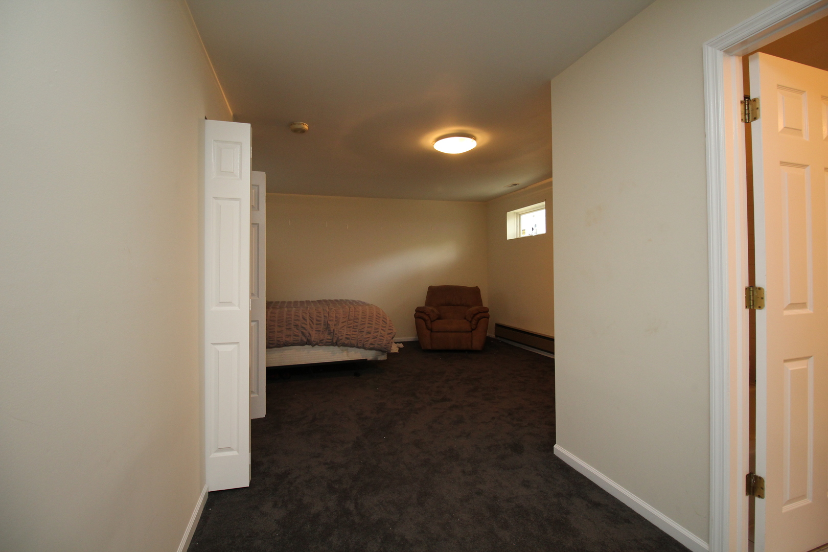 Undisclosed Address Chicago, IL 60657 - Photo 13 of 23 a view of bedroom and bathroom
