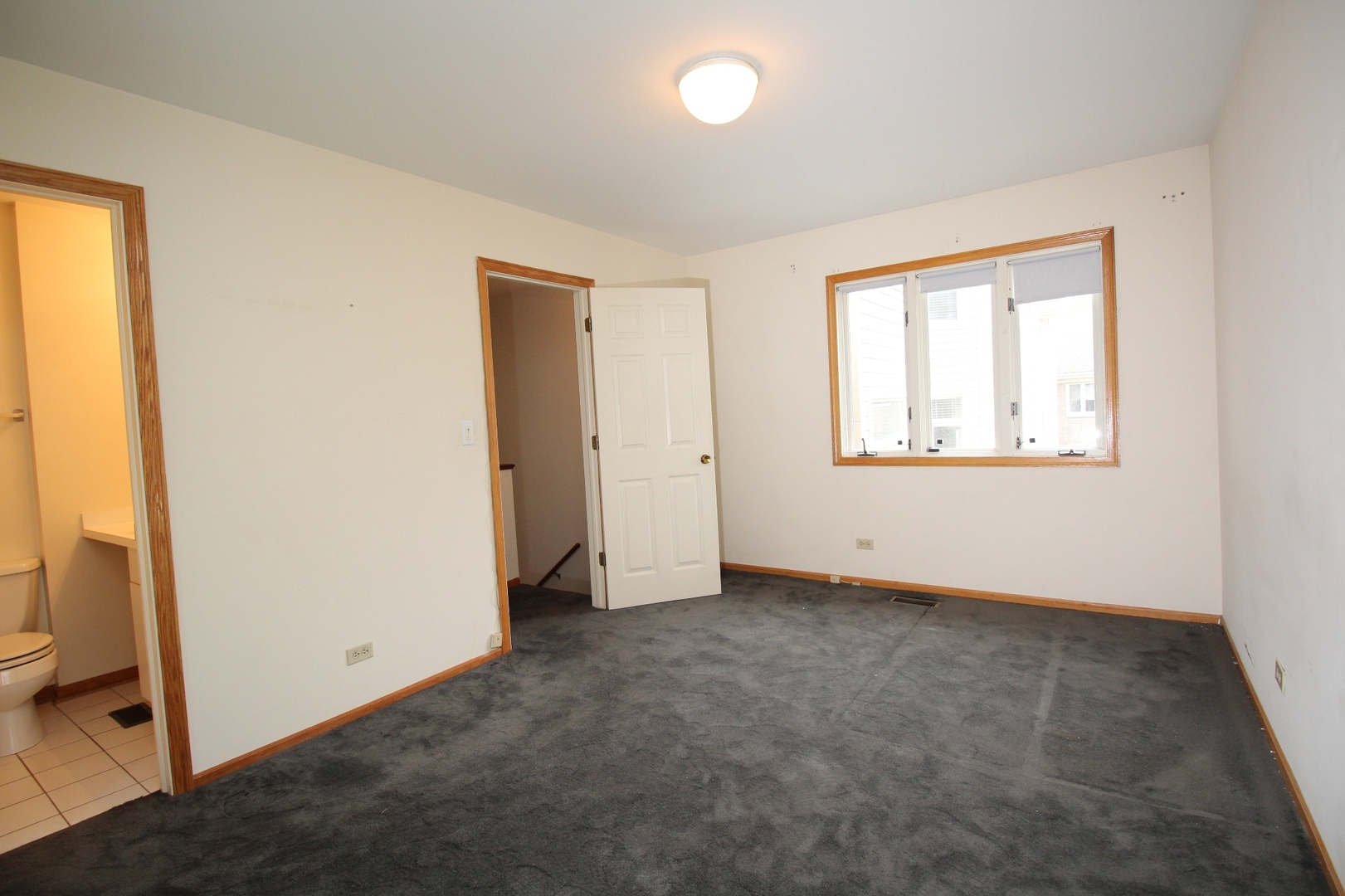 Undisclosed Address Chicago, IL 60657 - Photo 21 of 23 an empty room with windows