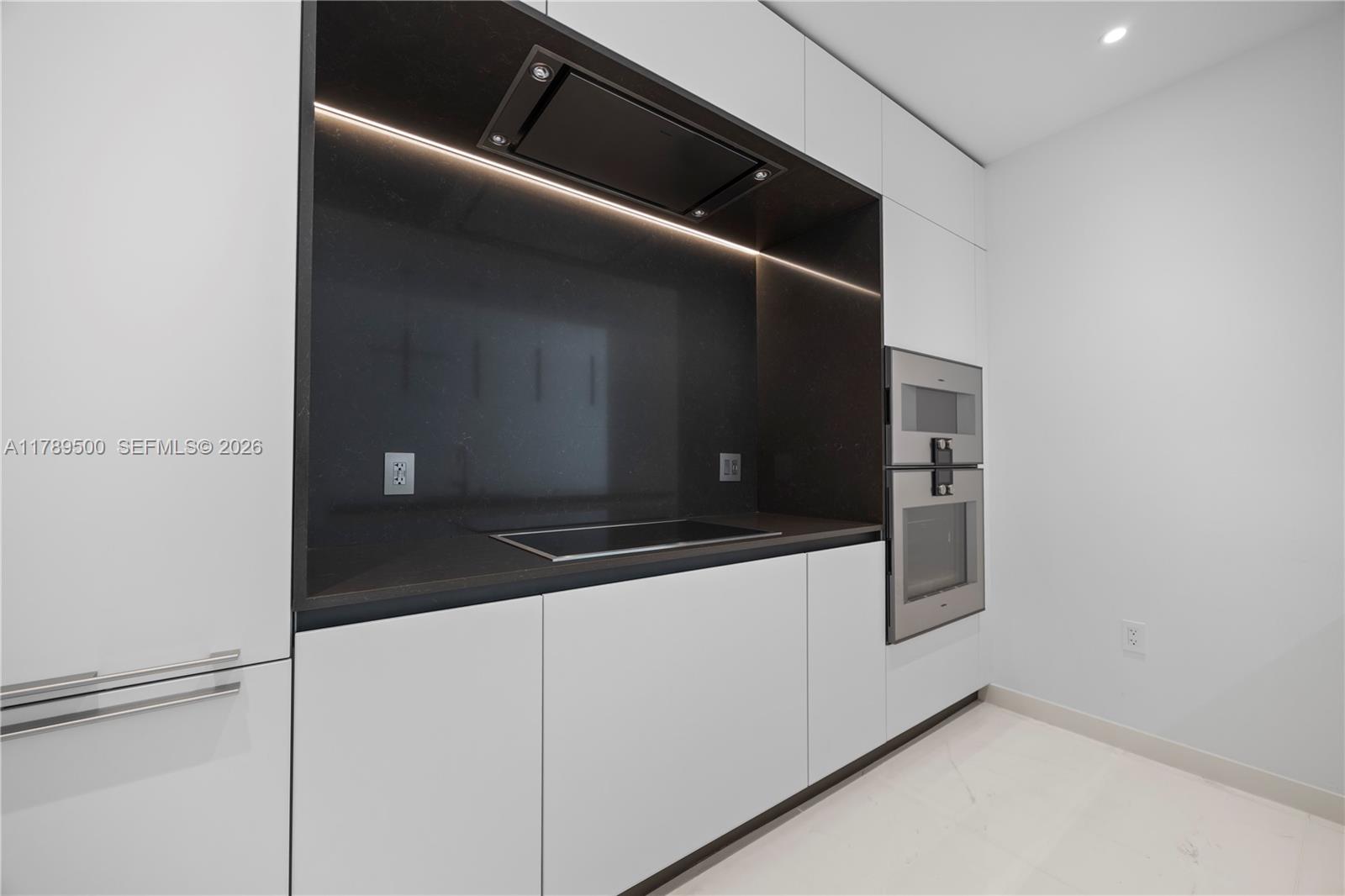 300 Biscayne Blvd Way, Unit 1102 Miami, FL 33131 - Photo 16 of 37 a view of washer and dryer