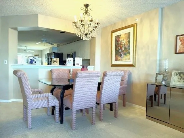 a view of a livingroom with furniture