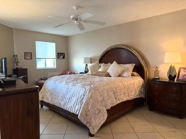 a en suite bathroom with a sink a vanity and a mirror