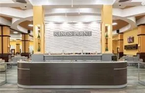 a room with view of kitchen