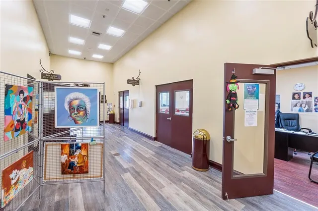 a view of a living room and kitchen