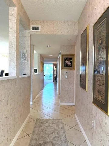 a wooden bench sitting in the middle of a park