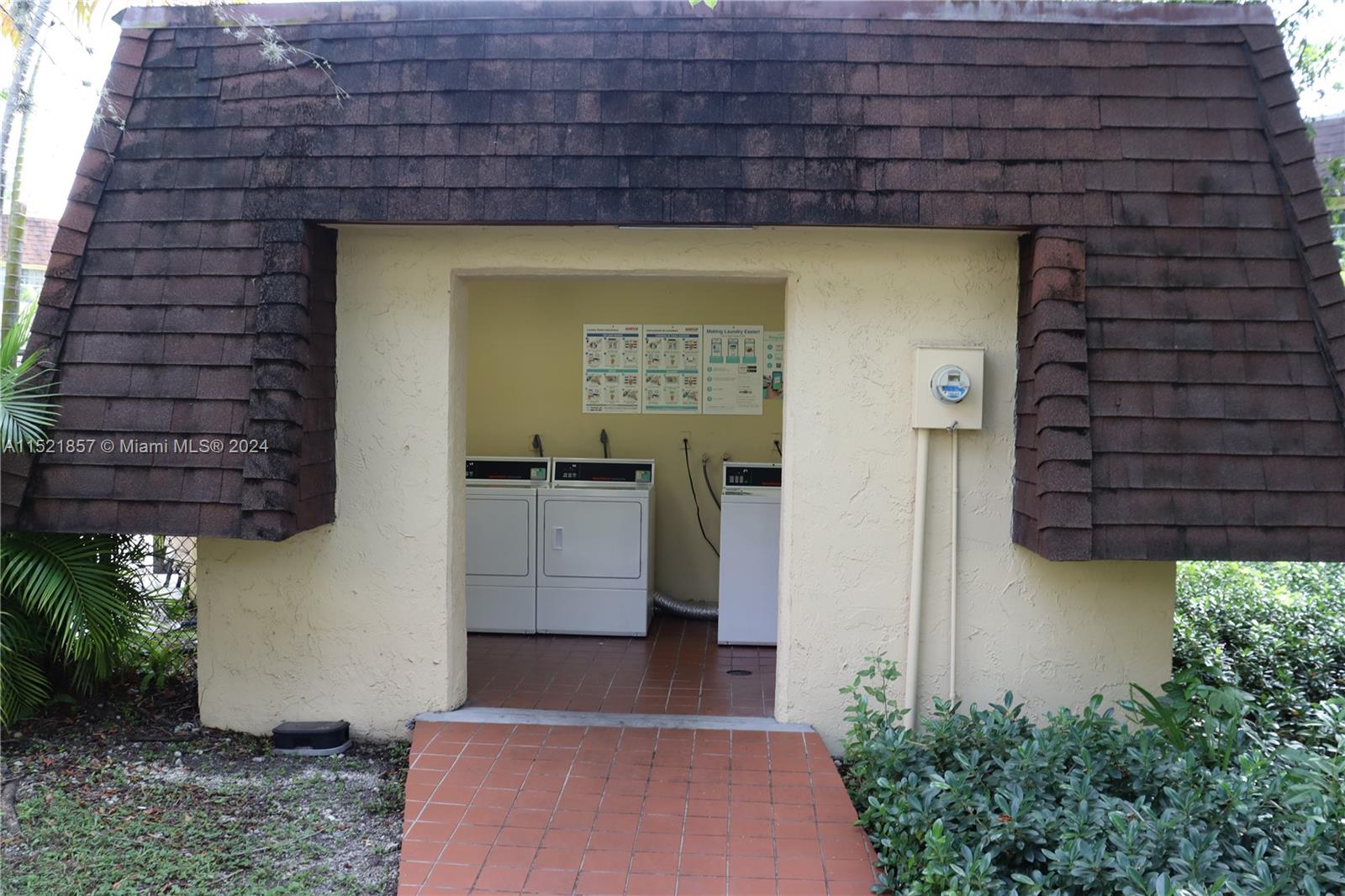 9015 Southwest 138th Street, Unit 162 Miami, FL 33176 - Photo 15 of 16 a view of a entryway door front of house