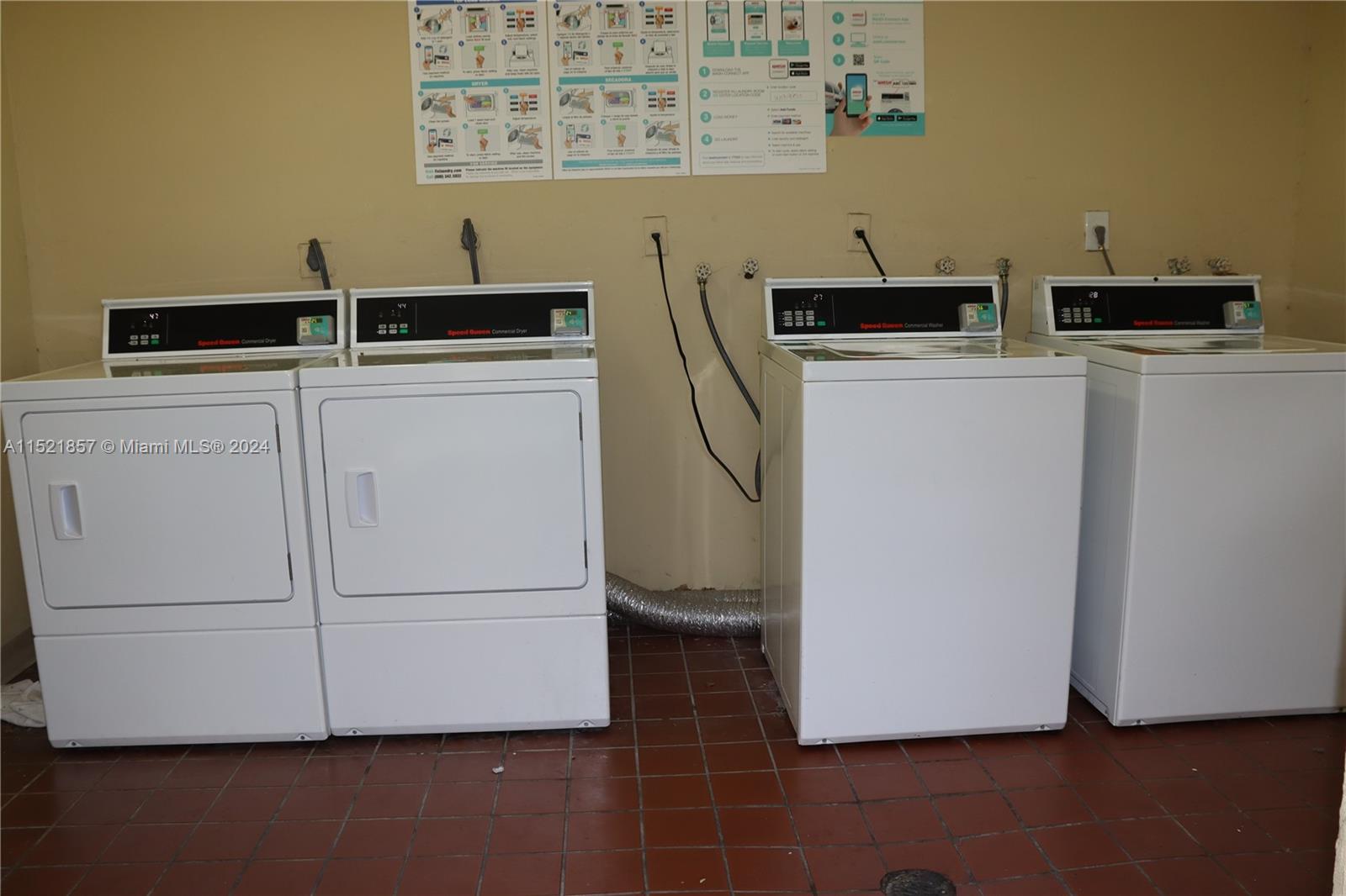 9015 Southwest 138th Street, Unit 162 Miami, FL 33176 - Photo 16 of 16 a utility room with dryer and washer