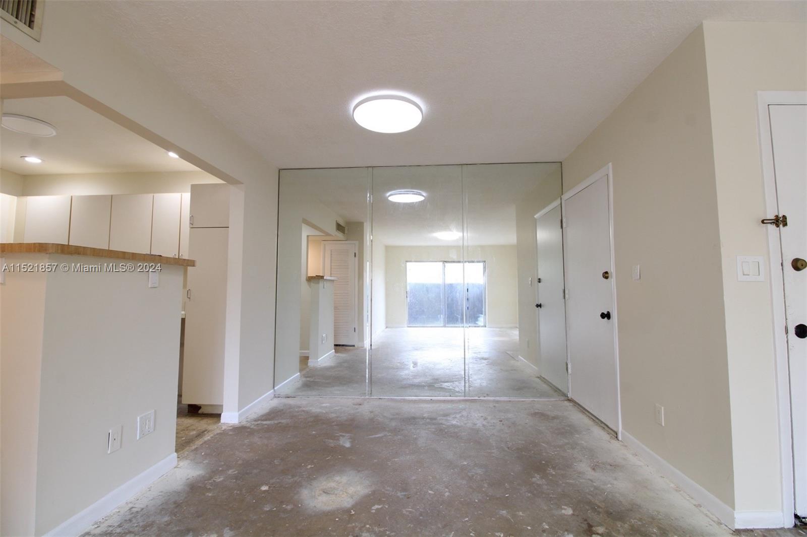 9015 Southwest 138th Street, Unit 162 Miami, FL 33176 - Photo 6 of 16 a view of a hallway