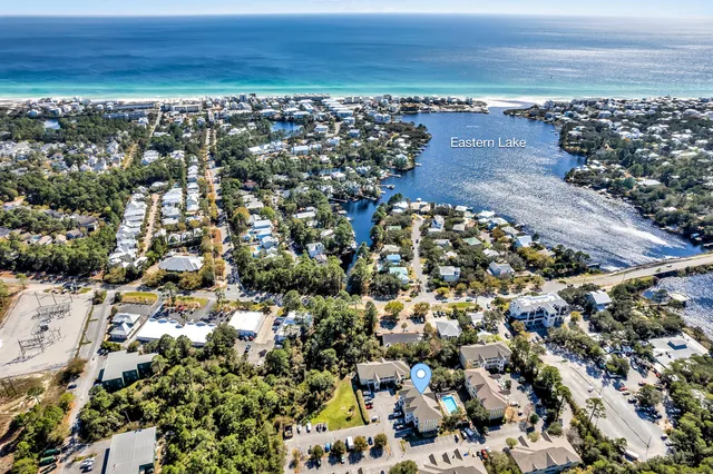a view of a house with swimming pool and porch
