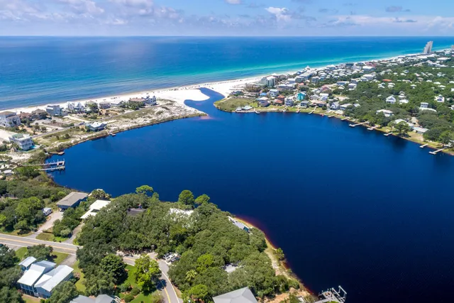 a view of a swimming pool with a lounge chairs