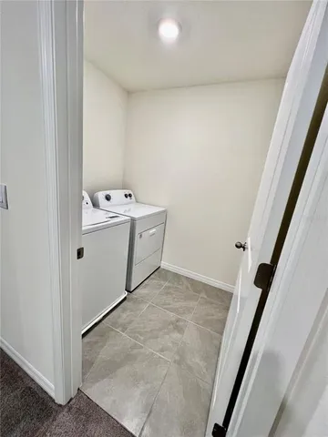 a view of utility room with washer and dryer