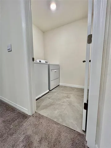 an empty room with cabinet