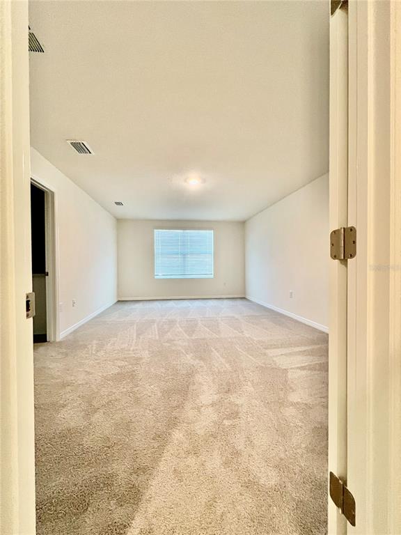 8884 Southwest 49th Circle Ocala, FL 34476 - Photo 23 of 39 a view of an empty room
