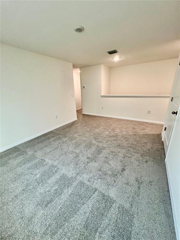 8884 Southwest 49th Circle Ocala, FL 34476 - Photo 31 of 39 an empty room with a empty space and windows