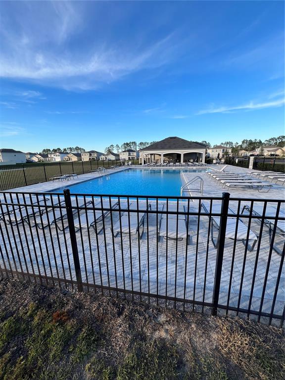 8884 Southwest 49th Circle Ocala, FL 34476 - Photo 6 of 39 a view of a street view from a balcony
