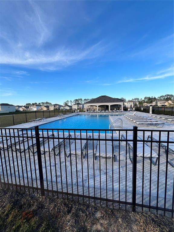 8884 Southwest 49th Circle Ocala, FL 34476 - Photo 7 of 39 a view of a balcony with city view
