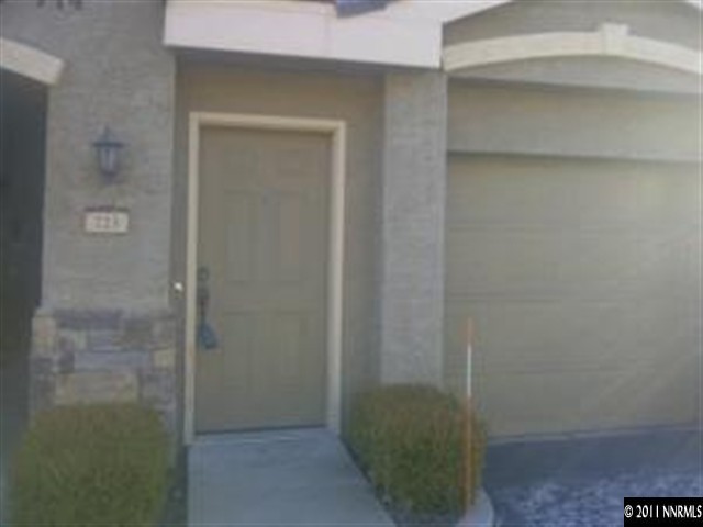 900 S Meadows, Unit 723 Reno, NV 89521 - Photo 1 of 1 a bathroom with a glass door shower