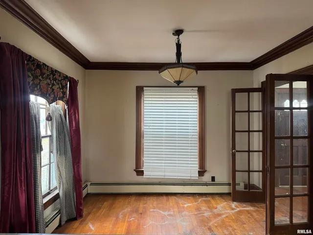 a view of empty room with windows