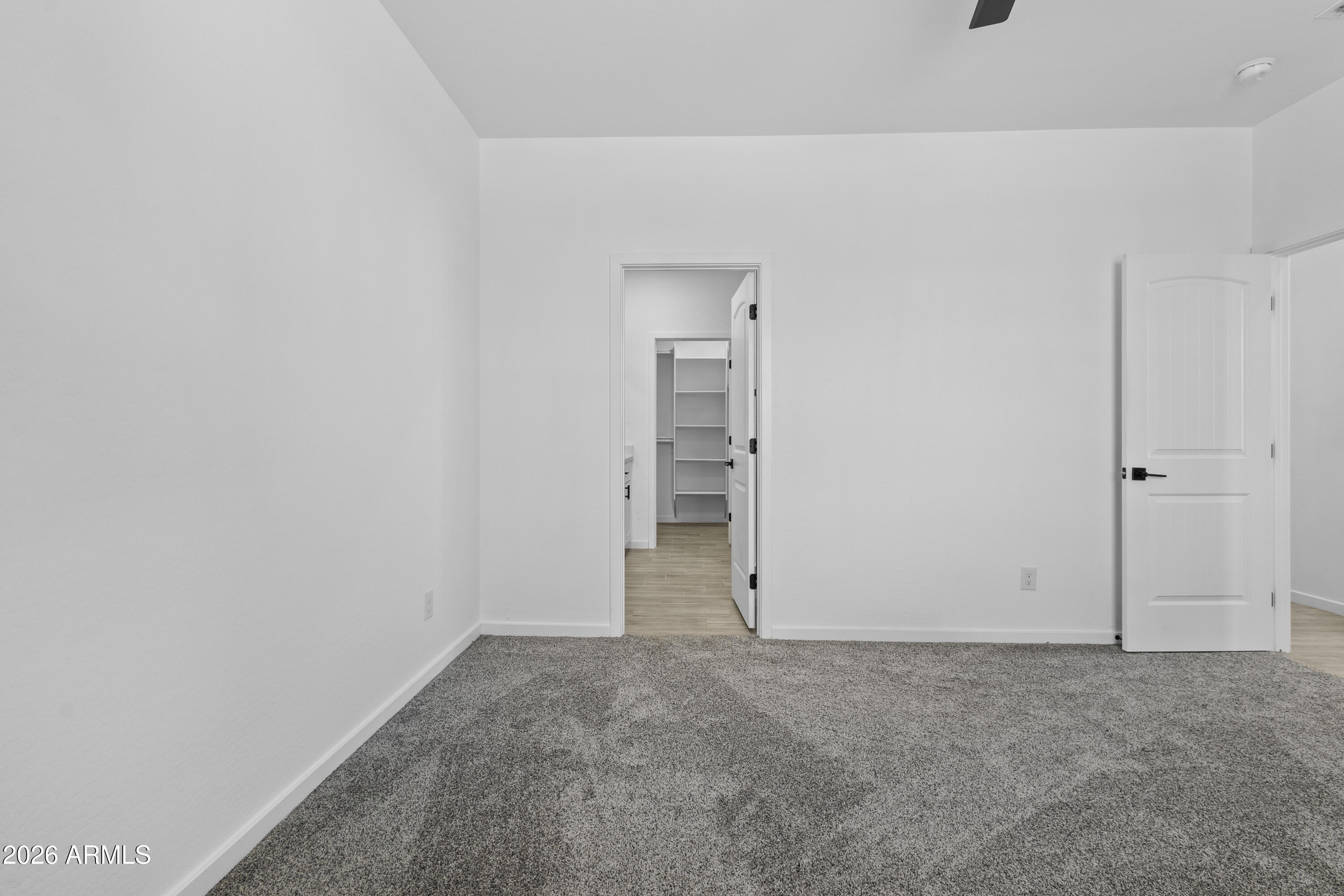 14045 South Berwick Road Arizona City, AZ 85123 - Photo 19 of 29 a view of an empty room and closet