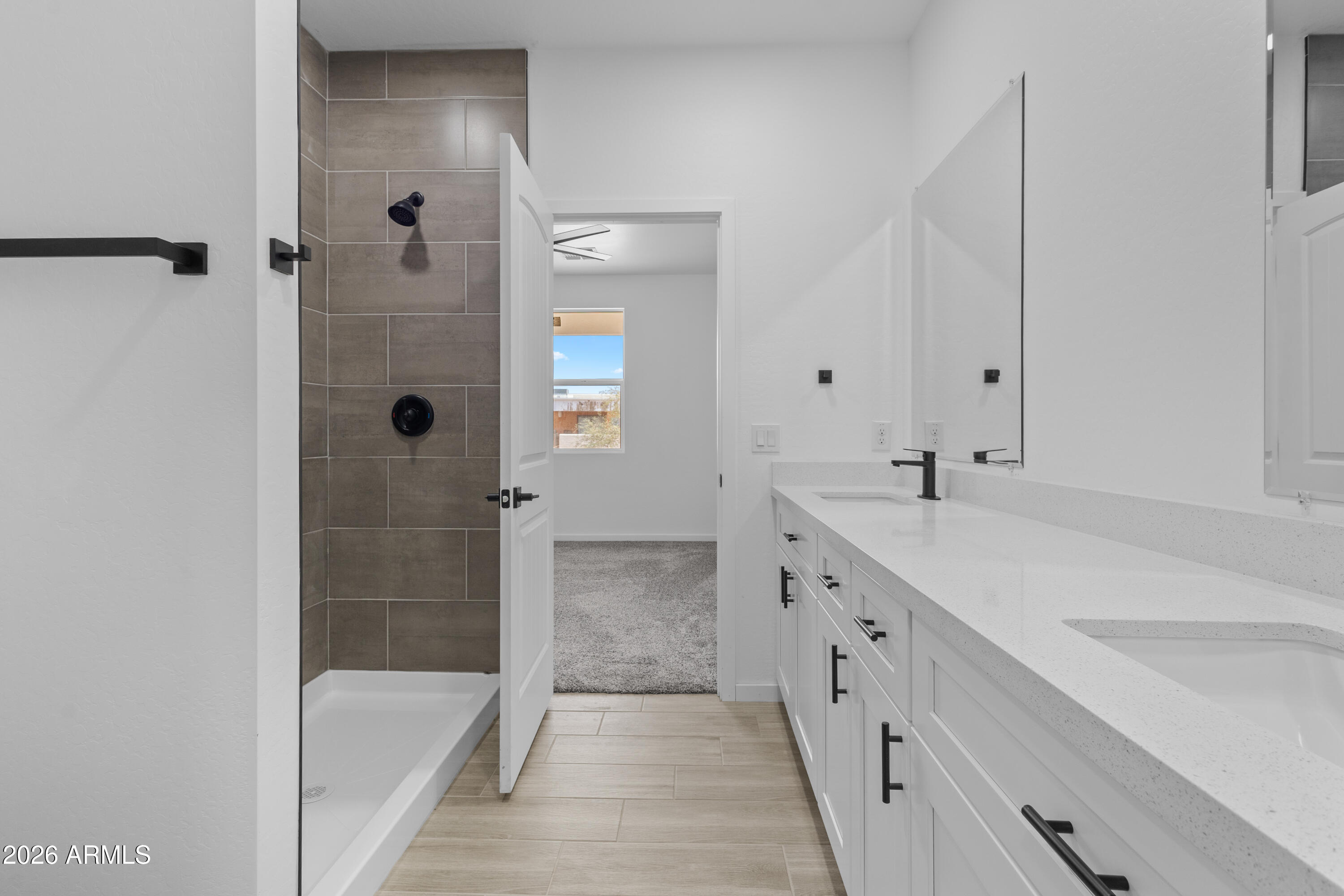 14045 South Berwick Road Arizona City, AZ 85123 - Photo 24 of 29 a bathroom with a tub sink and mirror