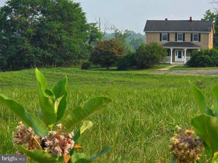 11601 Van Brady Road Brandywine, MD 20613 - Photo 3 of 12 Charming home amidst lush greenery.