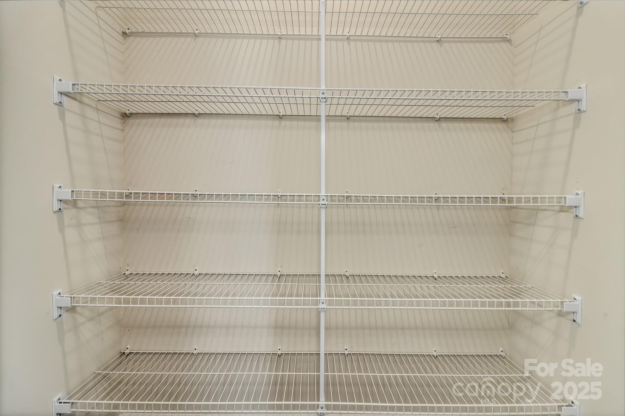 59 Thornberry Road Hendersonville, NC 28792 - Photo 23 of 48 a view of a room with racks on the wall