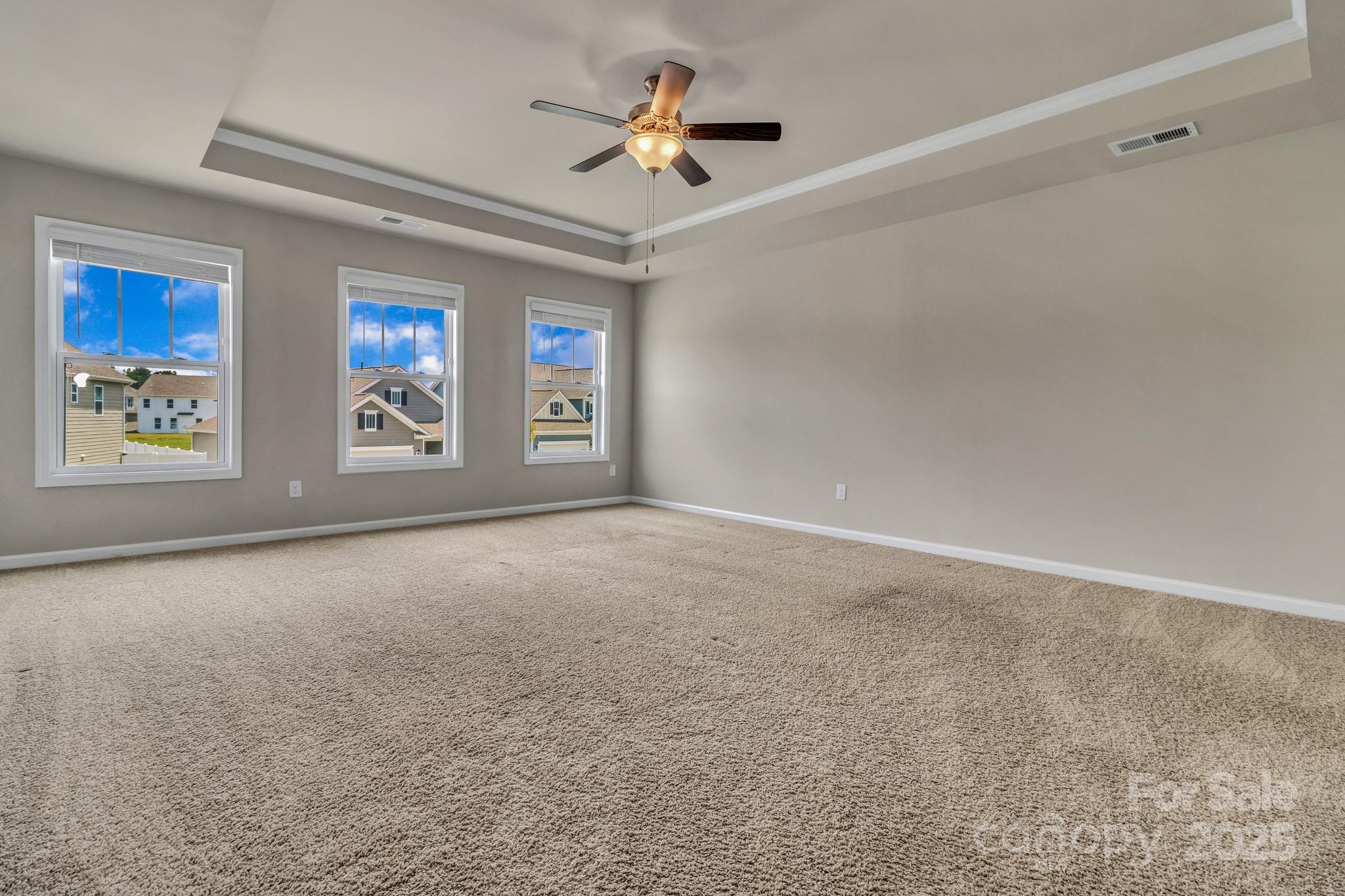 59 Thornberry Road Hendersonville, NC 28792 - Photo 27 of 48 a view of a livingroom with a ceiling fan and window