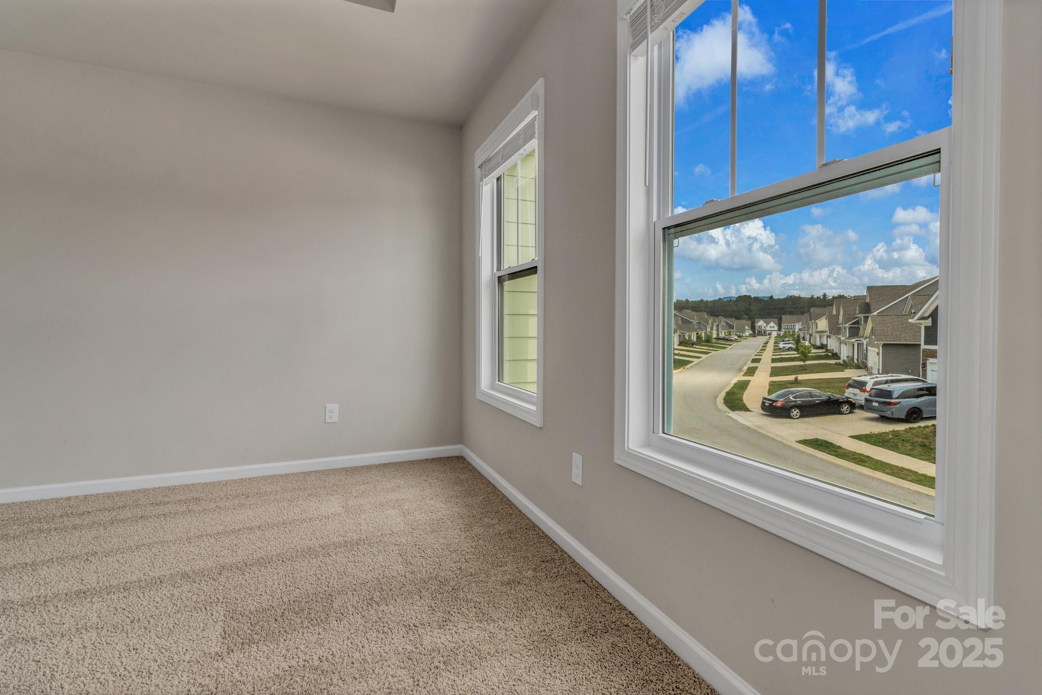 59 Thornberry Road Hendersonville, NC 28792 - Photo 30 of 48 a view of an empty room with a window