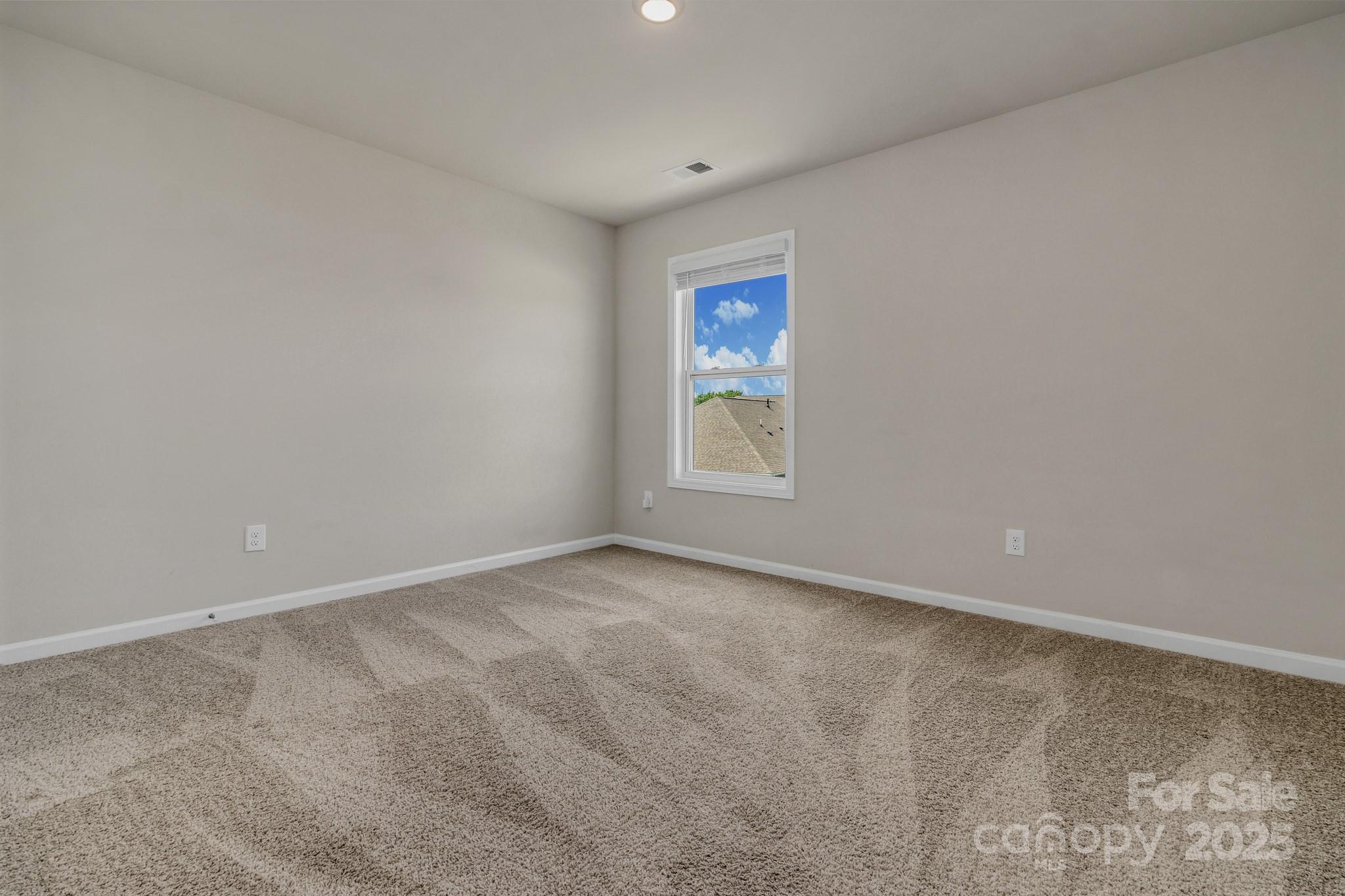 59 Thornberry Road Hendersonville, NC 28792 - Photo 41 of 48 an empty room with windows