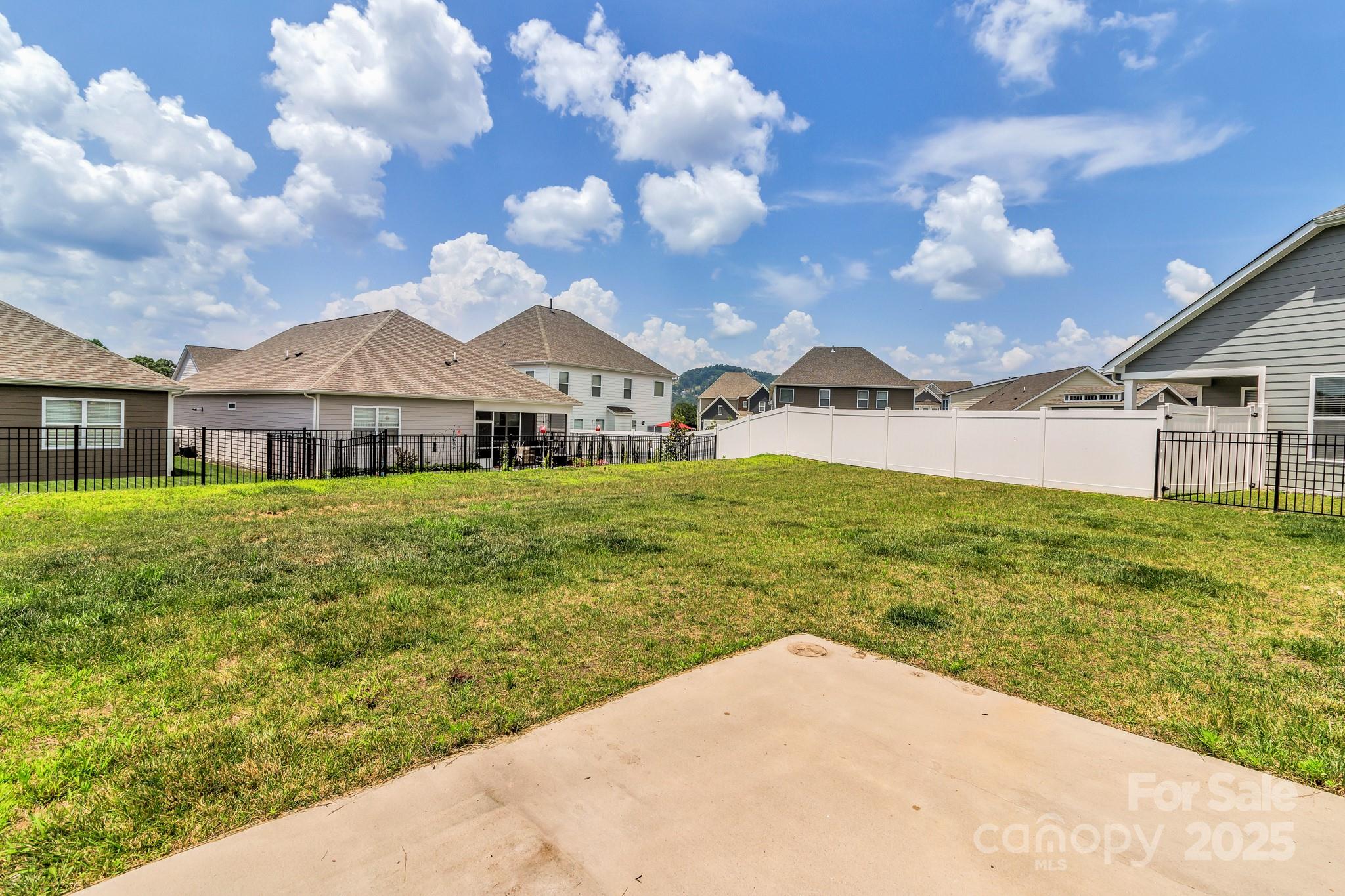 59 Thornberry Road Hendersonville, NC 28792 - Photo 46 of 48 a view of a house with a yard
