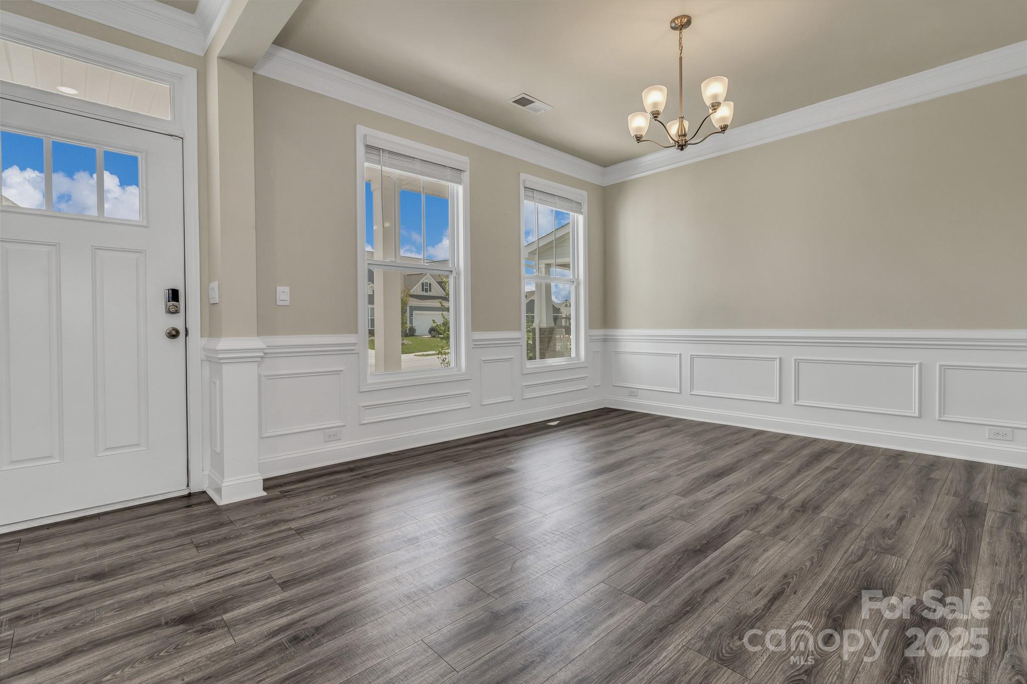 59 Thornberry Road Hendersonville, NC 28792 - Photo 5 of 48 a view of empty room with wooden floor and fan