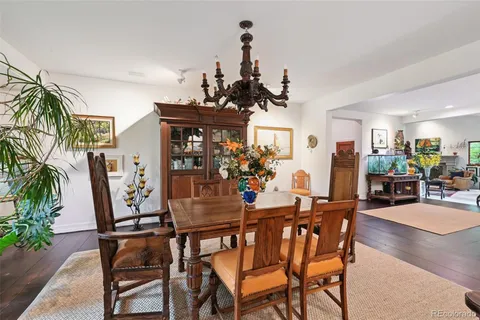 a room with furniture and a potted plant