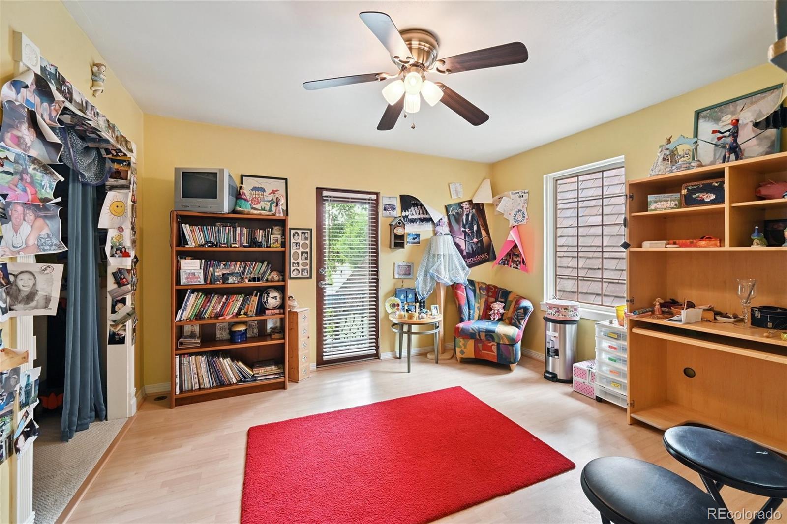 3391 Oak Street Wheat Ridge, CO 80033 - Photo 30 of 50 a view of a livingroom with furniture and toys