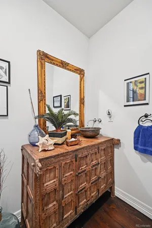 a bedroom with a bed and a fireplace