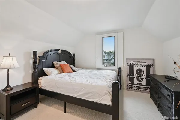 a view of a house with a yard porch and sitting area