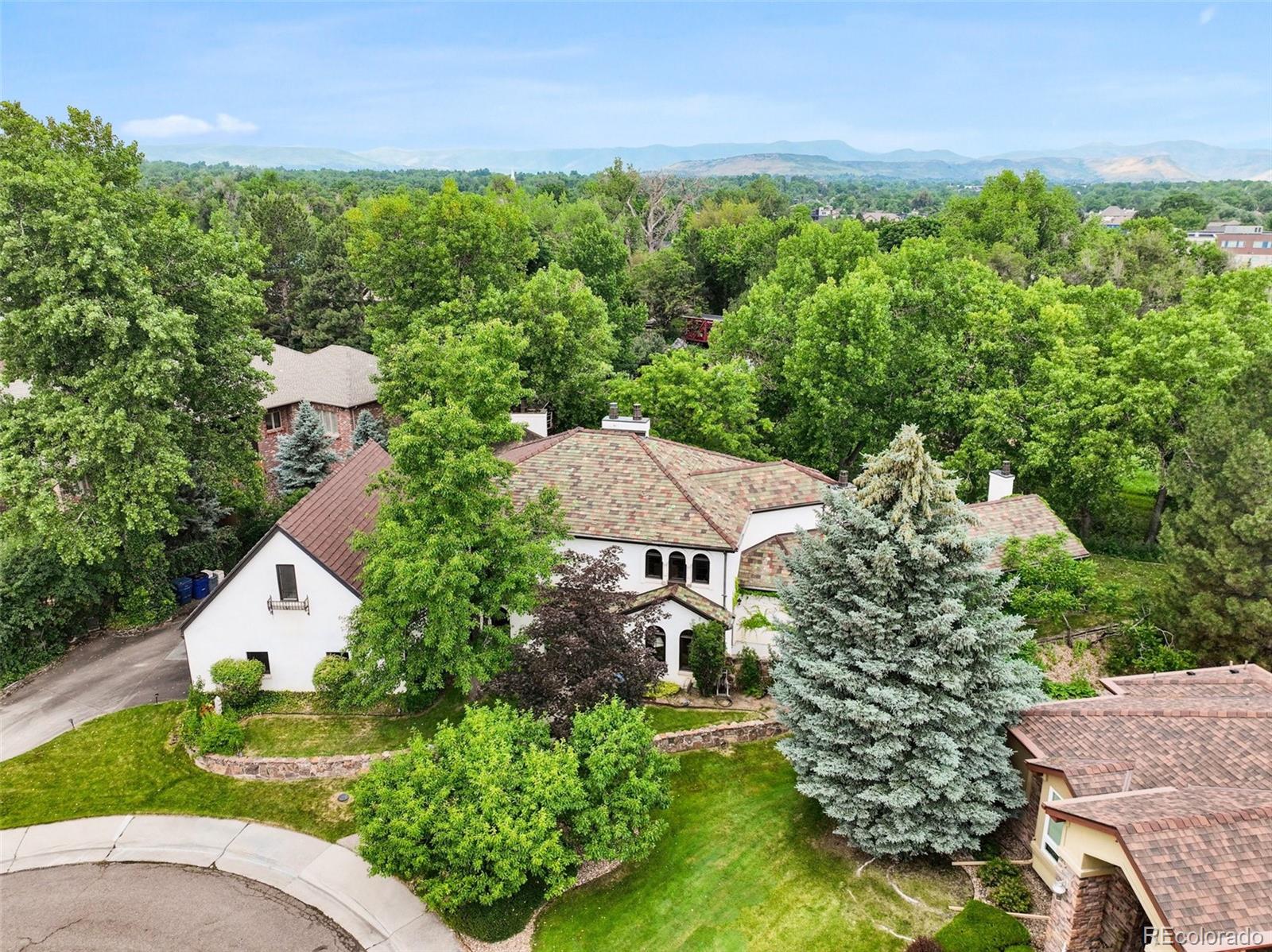 3391 Oak Street Wheat Ridge, CO 80033 - Photo 46 of 50 an aerial view of a house with garden space and street view