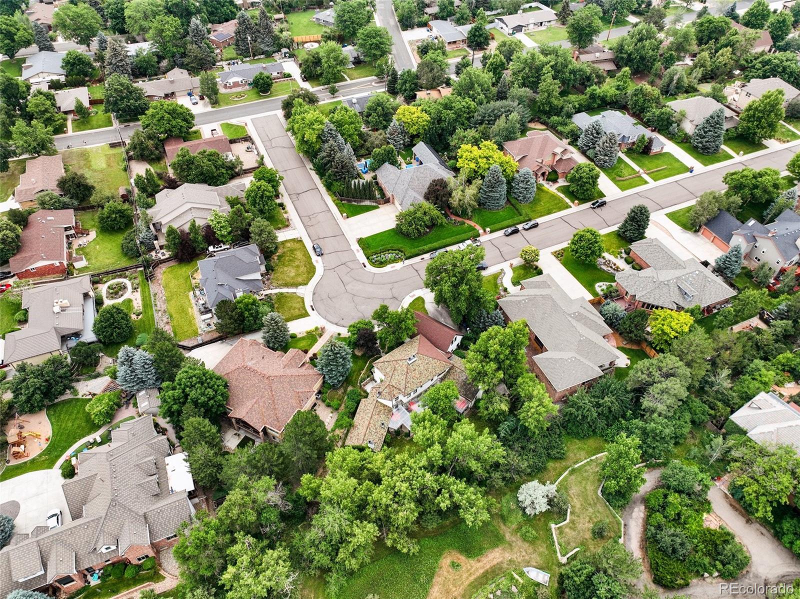 3391 Oak Street Wheat Ridge, CO 80033 - Photo 47 of 50 an aerial view of residential houses with outdoor space