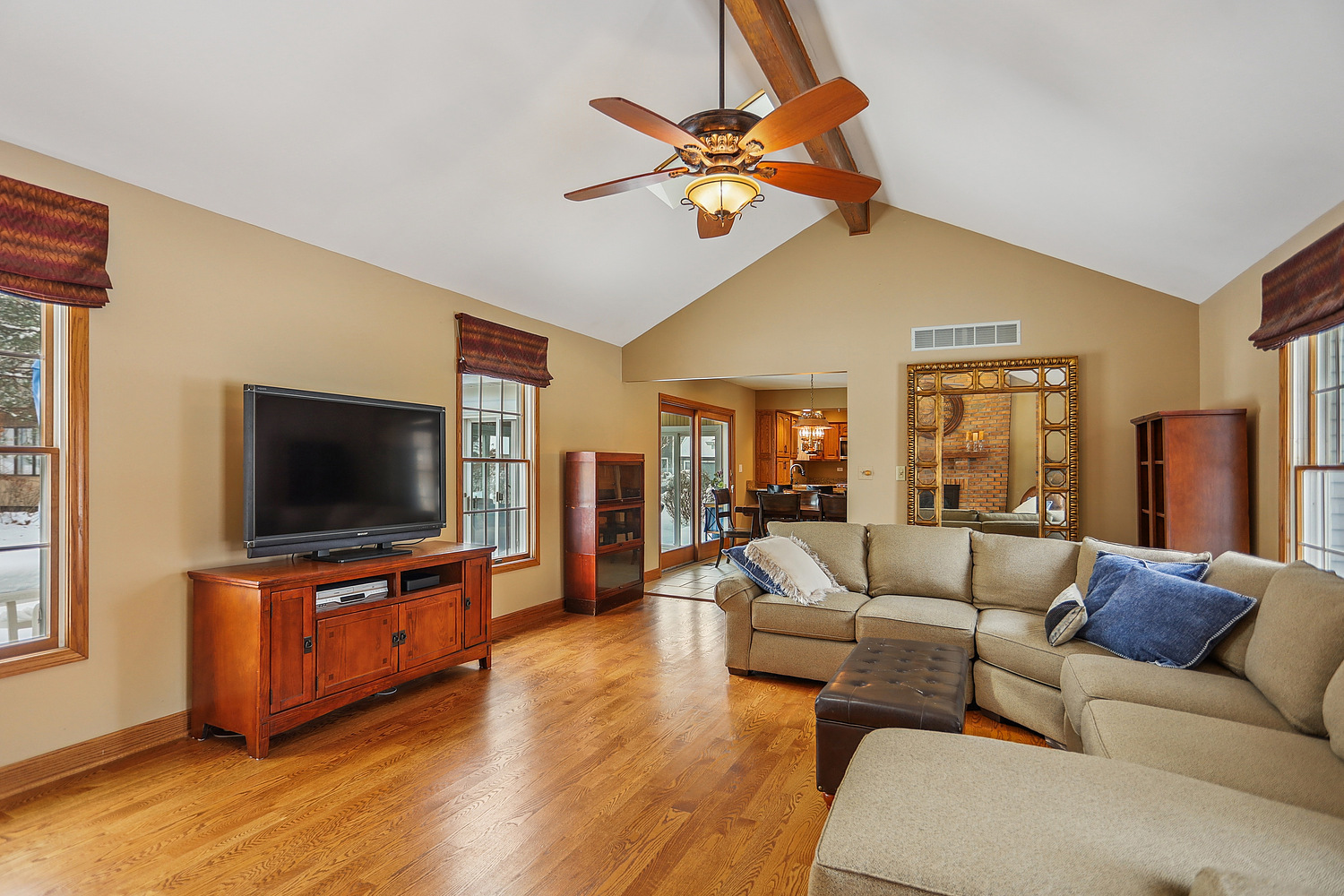 580 Moray Terrace Crete, IL 60417 - Photo 7 of 35 a living room with furniture and a flat screen tv