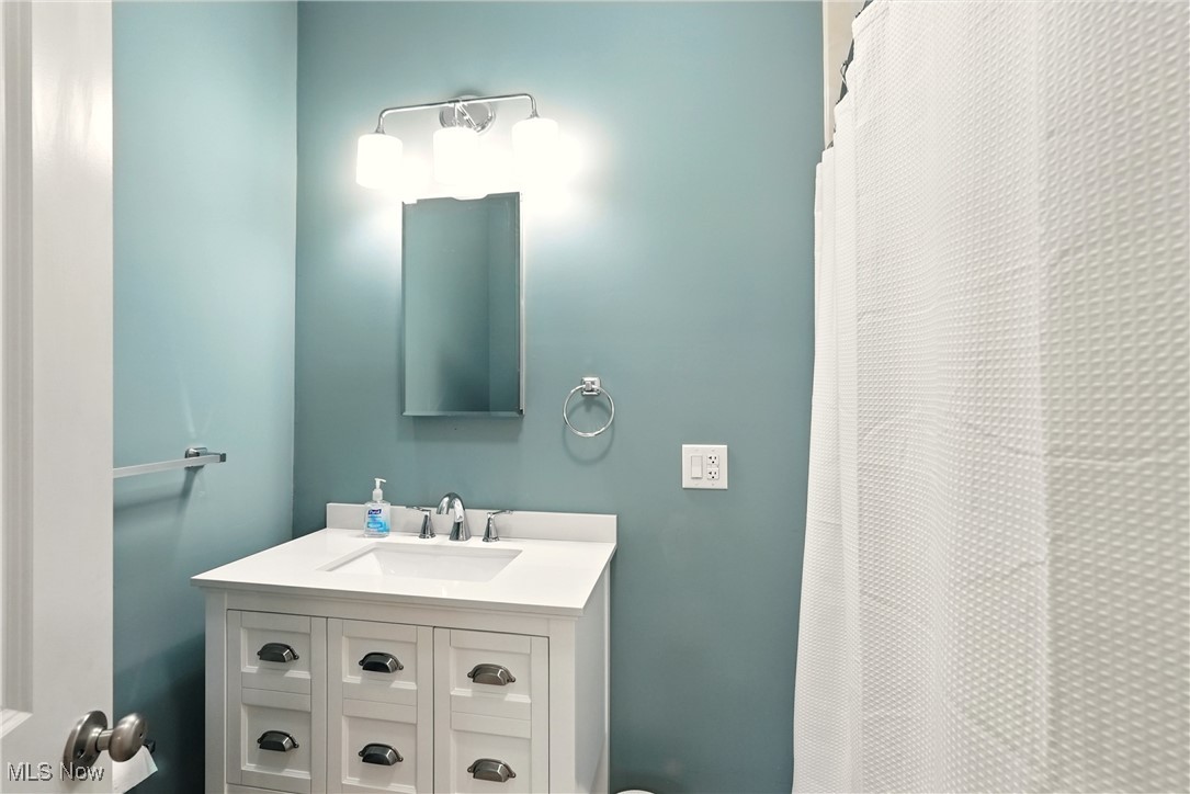2844 Kent Road Stow, OH 44224 - Photo 15 of 47 Full bath with vanity and a shower with shower curtain