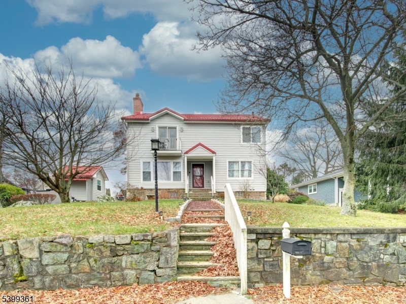 2 Papakating Road Hopatcong, NJ 07843 - Photo 1 of 28 a front view of a house with a yard