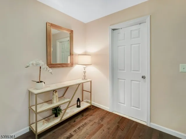 a view of an entryway with front door