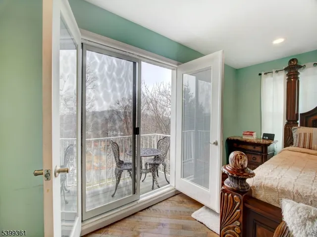 a view of a livingroom with furniture and windows