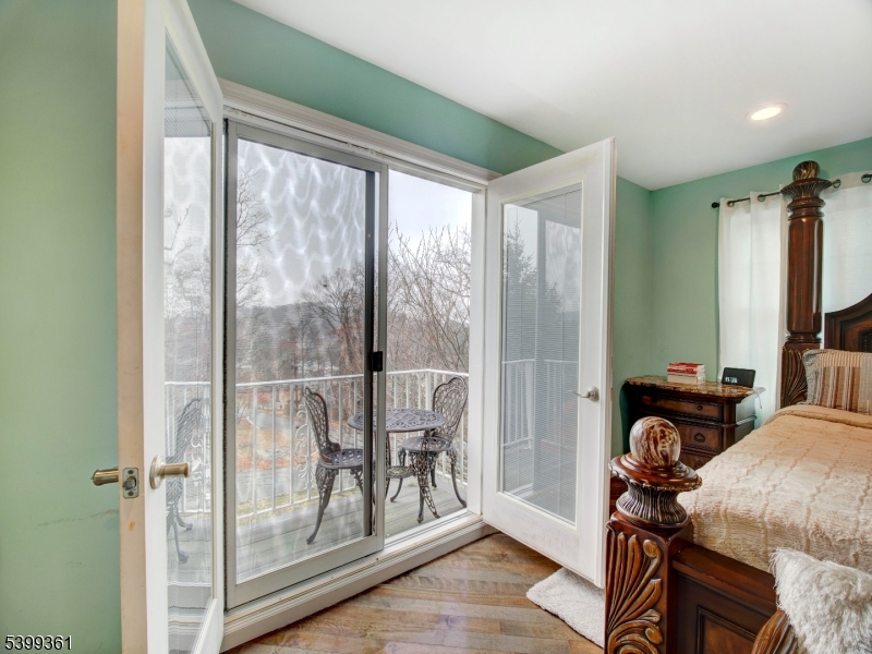 2 Papakating Road Hopatcong, NJ 07843 - Photo 15 of 28 a view of a livingroom with furniture and windows