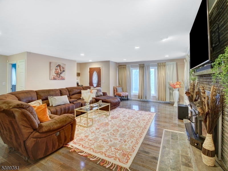 2 Papakating Road Hopatcong, NJ 07843 - Photo 7 of 28 a living room with furniture bathtub and a flat screen tv