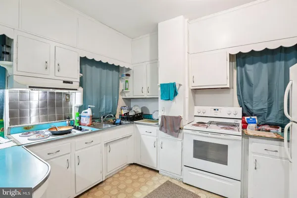 a bathroom with a shower toilet and a sink