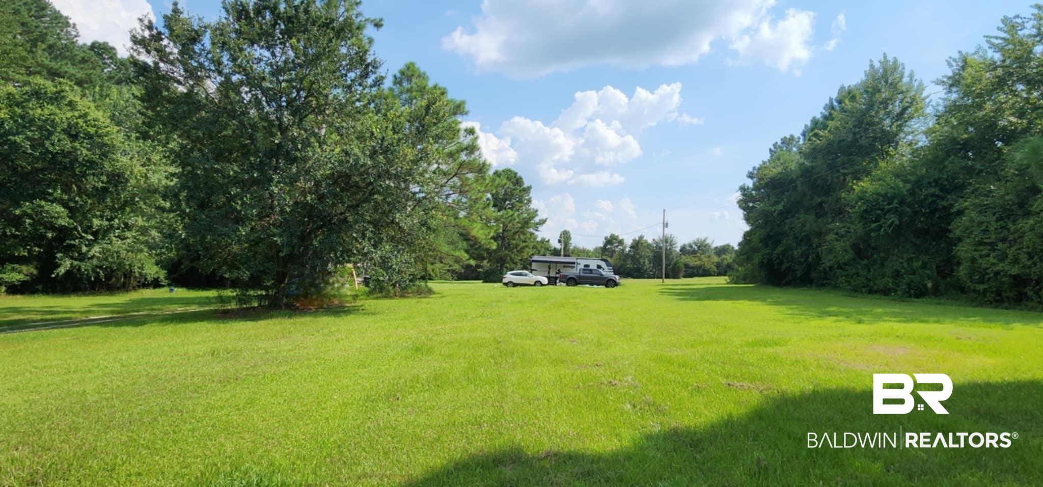 29049 Loper Road Loxley, AL 36551 - Photo 1 of 23 View of grassy yard