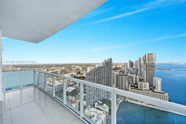 a view of a balcony with city