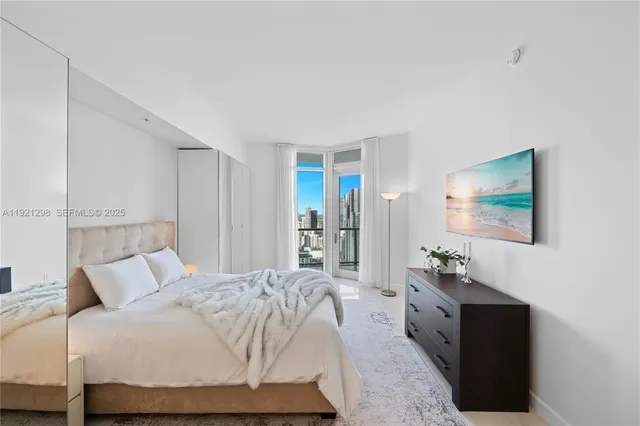 a view of an ocean and city